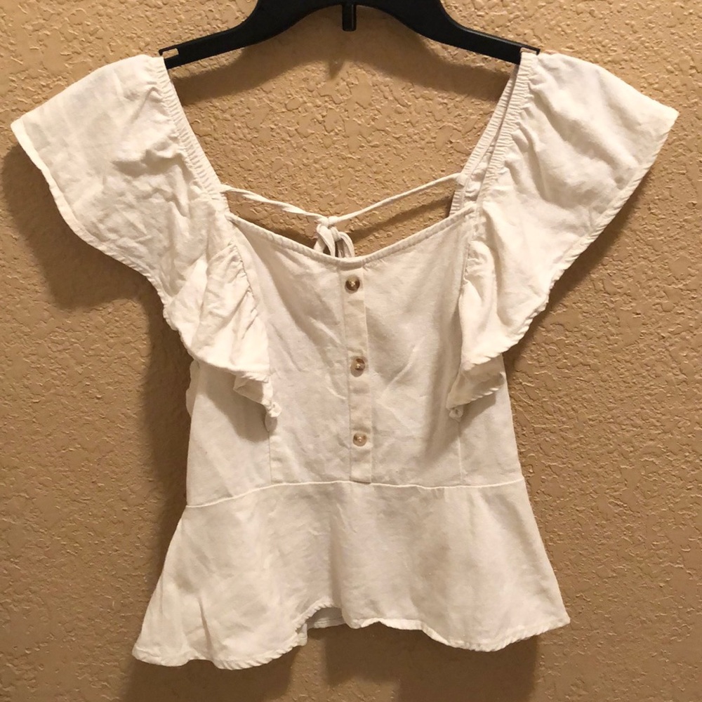 Gently worn E & M summer top. Elastic waist back. Tie back. Great condition.